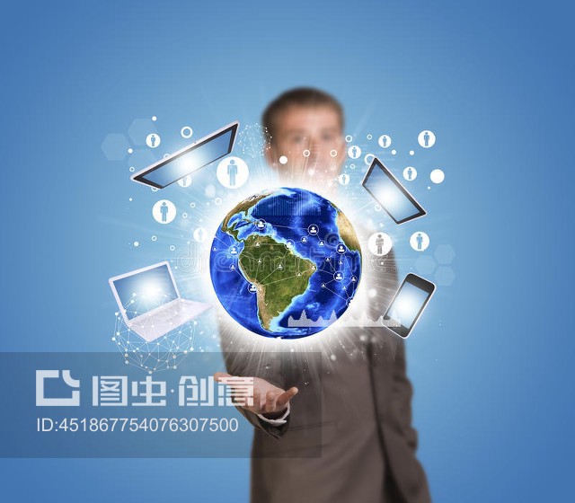 商人用电子产品,图形来支撑地球Businessman hold Earth with electronics, graphs